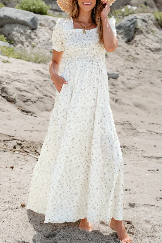 Midi dresses with printed lining for a hidden and stylish detailFloral Smocked Tiered Maxi Dress Midi dresses with printed lining for a hidden and stylish detailFloral Smocked Tiered Maxi Dress